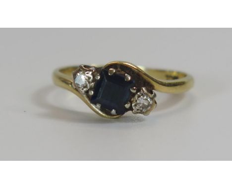 An 18ct Gold, Sapphire and Diamond Three Stone Ring, 11.5mm setting, 4.8mm sapphire, size M.5, 2.8g 