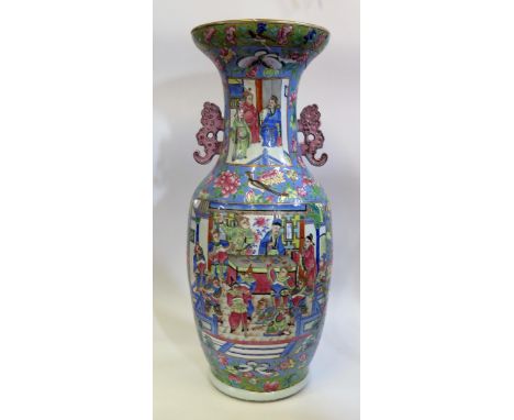 A Large 19th Century Chinese Cantonese Export Ware Famille Rose Vase decorated with figures on a light blue and floral decora