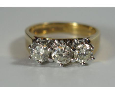 An 18ct Yellow Gold and Diamond Trilogy Ring, size O.5, 7.7g, EDW 1.5ct 