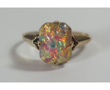 A 9ct Gold and Ammolite Ring, 10.5x8mm stone, size K.5, 1.9g 