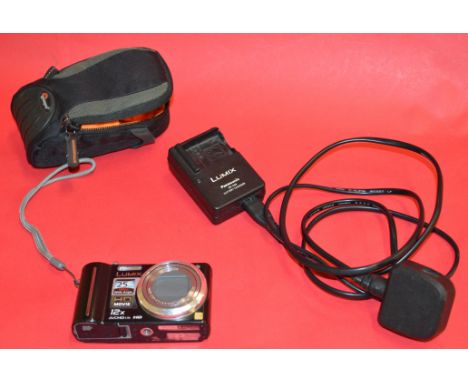 PANASONIC LUMIX digital camera with bag, charger etc.