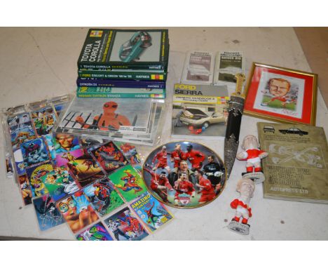Mixed lot including Haynes manuals, Marvel related lobby cards and trading cards and a repro ornamental dagger