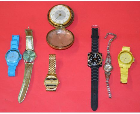 POLICE > 6 assorted wrist watches and a vintage travel clock. (7) [NO RESERVE] [VAT ON HAMMER PRICE]