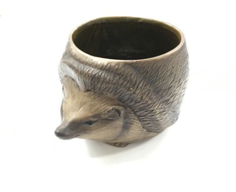 A Poole Pottery stoneware plant pot modelled as a Hedgehog.