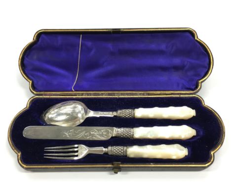 A cased silver and mother of pearl Christening set comprising knife, fork and spoon in fitted case.