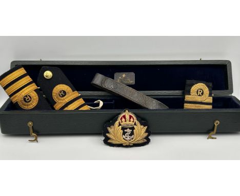 A box of Royal Navy dress wear together with one other. 