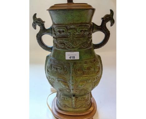 Chinese Bronze Gu vase table lamp with trumpet neck and archaic design. 