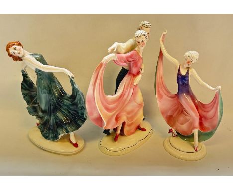 A Katzhütte dancing coupleshe is wearing a pink dress, he in grey trousers, on a domed plinth, printed green mark, together w