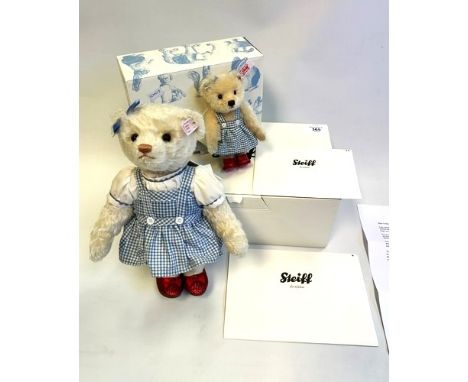 Dorothy, The Stieff Wizard of Oz Musical Bear - 75 year anniversary bear, comes wearing her famous cornflower blue gingham pi