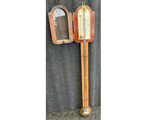 Early 19th century mahogany stick barometer, arched indicator, plain case, turned cistern cover