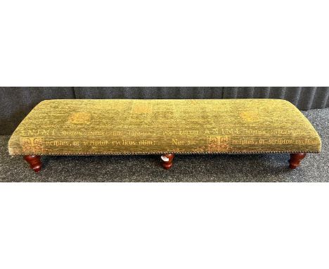 A low fender stoolUpholstered velvet upholstered top raised on circular short legs