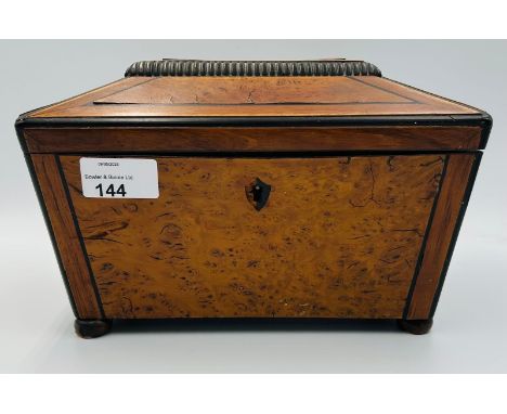 Yew wood early 19th century  tea caddy of sarcophagus formTwin divisions with miscellaneous costume jewellery