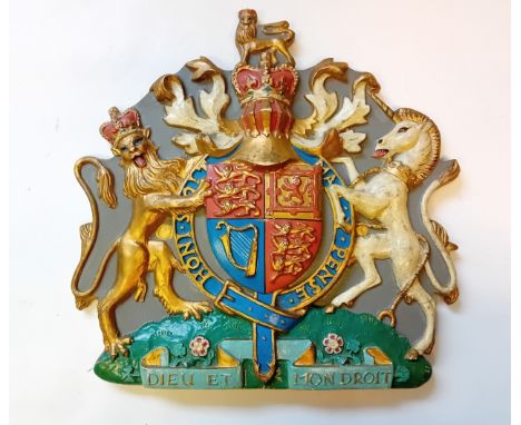 Plaque showing the Royal Coat of Arms of the United Kingdom, symbolizing the monarchy and the union of its constituents count