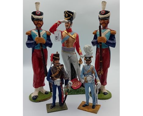 Pair of French Napoleonic cast metal soldiers, porcelain British army officer and two others.