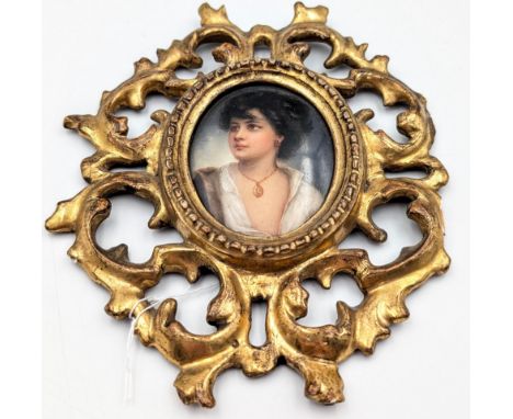 Miniature portrait in ornate frame 