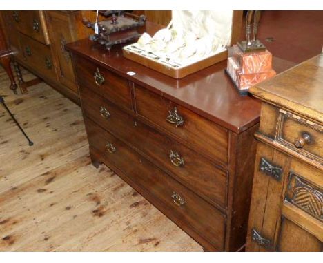 19th Century mahogany chest of two short above two long drawers on bracket feet