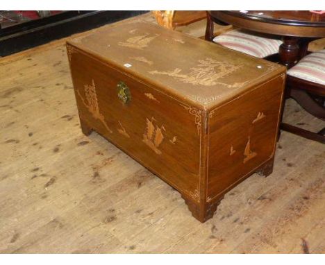 Oriental camphor wood trunk with applied decoration