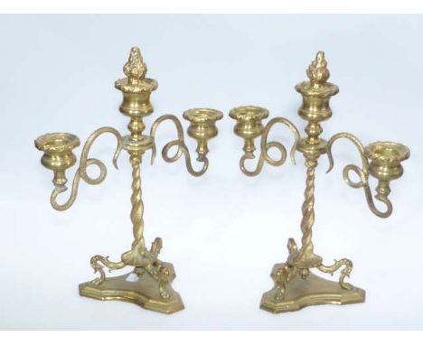 Pair of brass three-light candelabra, cast with scrolling snakes