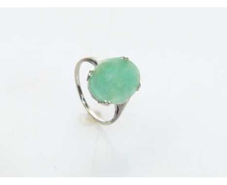 Jadeite ring, the shank unmarked but tests as 18ct, size K½