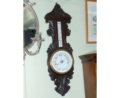 Late Victorian carved oak aneroid barometer