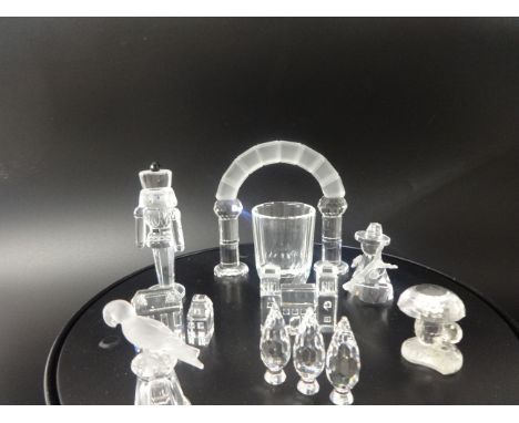 Swarovski crystal glass  Various items comprising of Nutcracker, The City Gates, Houses Number 111 and 1V in the Silver City 