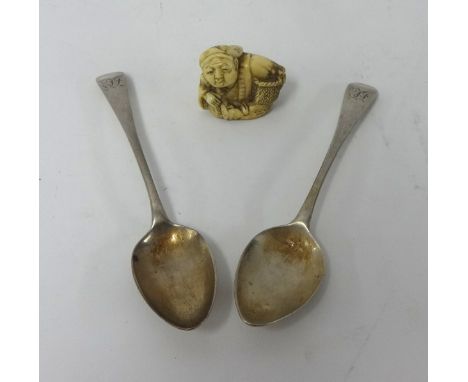 Two Georgian silver teaspoons and a carved ivory Netsuke.