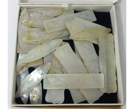 A small collection of Mother of Pearl gaming counters