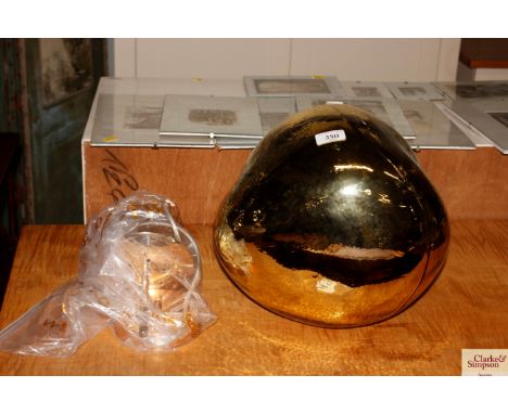 A ceiling light fitting with large gold coloured glass shade (new)