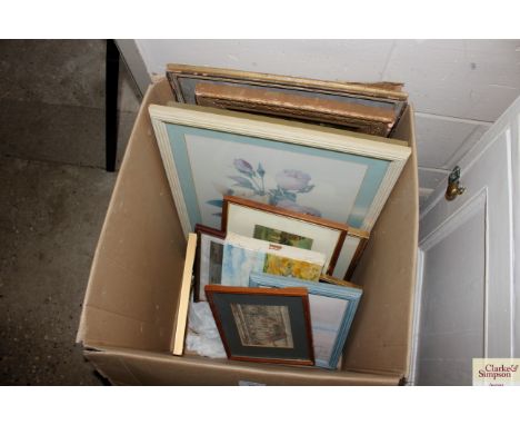 A box of miscellaneous pictures and prints