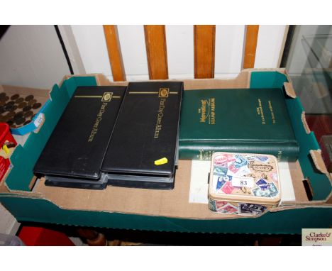 Three albums of First Day covers, Great Britain mounted stamps etc.