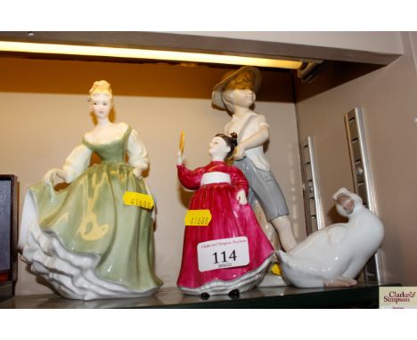 Two Royal Doulton figurines and two Nao figurines 