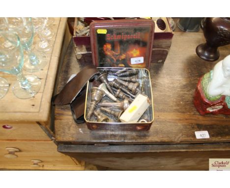 A box containing various instrument mouthpieces, to include Salvation Army examples 