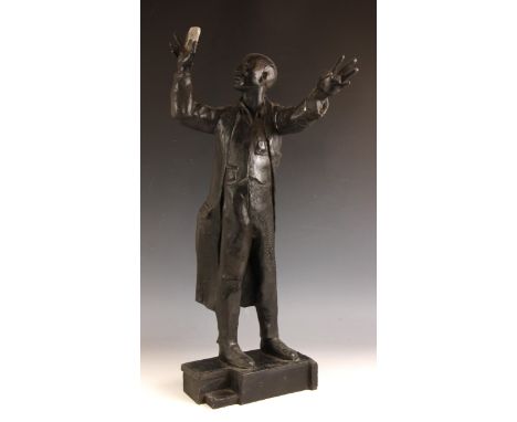 John W Mills (1933-2023), Scientist holding a lens to the light, Patinated resin on integral base, 62.5cm high overall