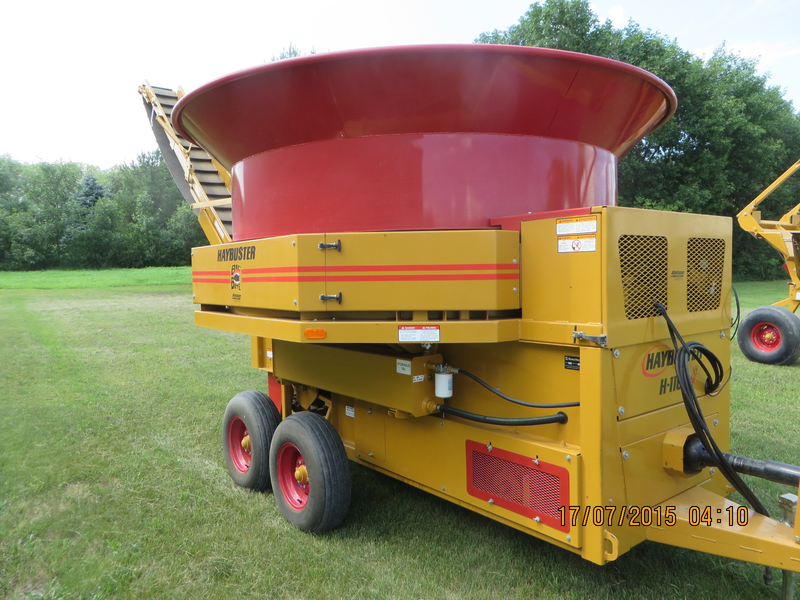 2004 Haybuster Tub Grinder model H1100 tilt tub with belt conveyor