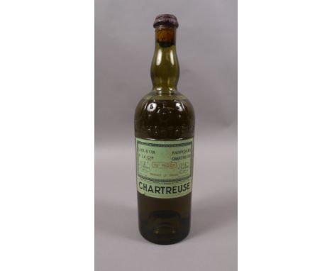 Old bottling of Green Chartreuse, 96° Proof, level above mid-shoulder, good label, slightly scuffed, cork seal, bottle moulde