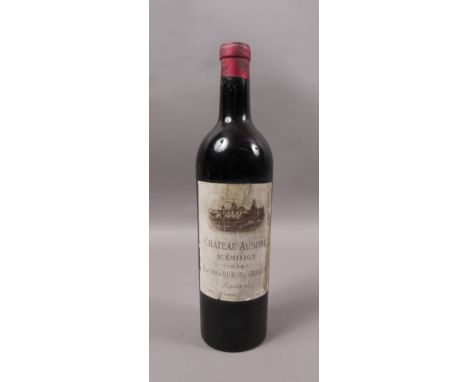 Château Ausone 1934 CB, 1er Grand cru Classé (A) St Emilion, 1 bottle, label largely sound but stained and slightly rubbed, b