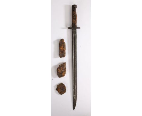 First World War shell splinters with label stating 'Shell splinters found by Brenden Cresswell in the "Sunken * Lane" between