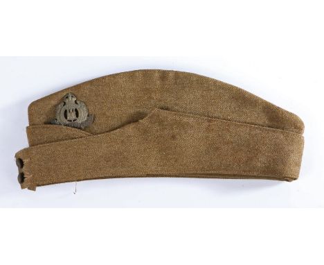 Second World War British Army Side Cap, Kings Crown buttons to the front, badged to the Suffolk Regiment