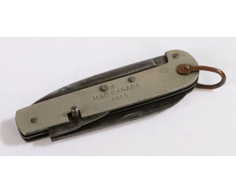 First World War Canadian military clasp knife, stamped with Canadian Broad Arrow mark above 'M &amp; D CANADA' above the date
