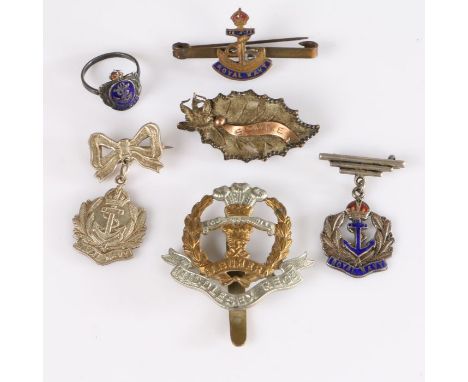 A First World War commemorative brooch for the Battle of the Somme, pin and clasp fitting to reverse, together with a Sterlin