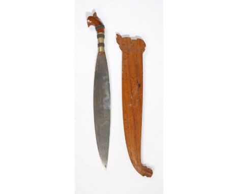 Southern Phillipine Moro Barong, steel leaf shaped blade, carved wooden handle with brass mount, held in carved wooden scabba