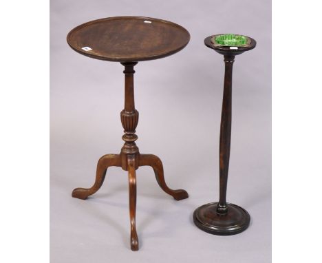 A mahogany tripod table with a circular top, &amp; on a fluted vase-turned centre column &amp; three cabriole legs, 39.5cm di