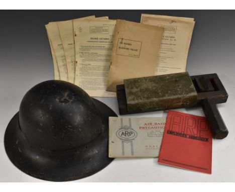 World War Two - Civil Defence - an ARP Zuckerman helmet, gas rattle, handbook, cigarette cards, etc 