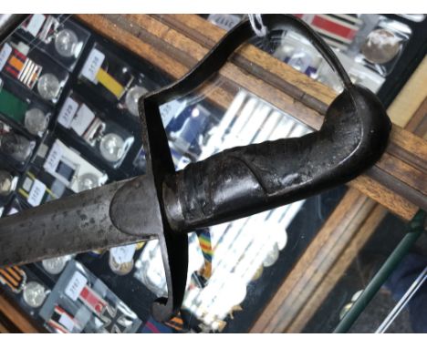 A George III 1796 pattern Light Cavalry Troopers sword. 84cm blade with crowned inspection markings, marked to spine Woolley 