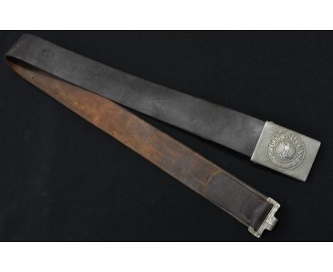 A WW2 German Army Wehrmacht Leather belt, the Tab maker marked B. Haarman Ludenscheid 1936