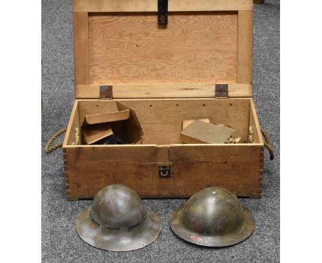 World War Two - a Zuckerman helmet; a Brodie helmet; gas masks; munitions crate 