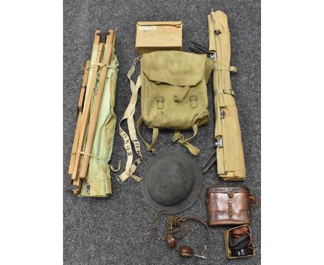 World War Two - a Brodie helmet; a field stretcher; field glasses; headphones; etc 