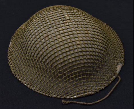 A British steel 'Brodie' helmet, 31cm wide