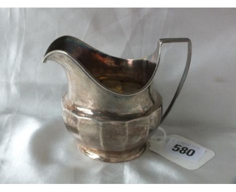 Georgian helmet shaped cream jug with panelled sides, 4.5” over handle Lon 1804 110g.       