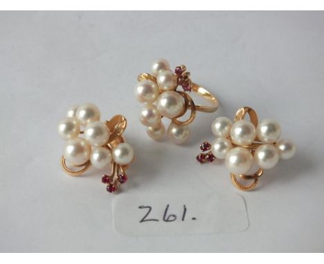 Large pair of pearl and ruby earrings set in 14ct. gold    